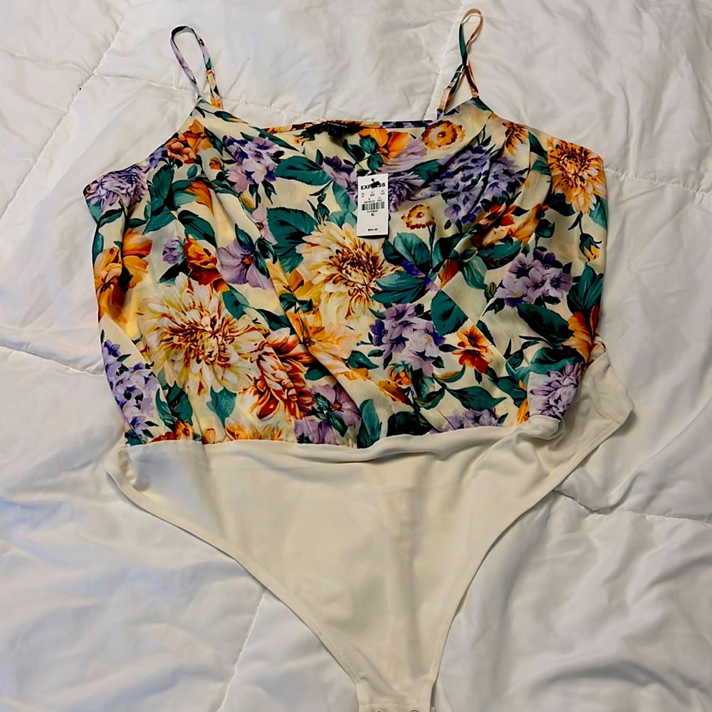 Body suit from express ivory with flower detail